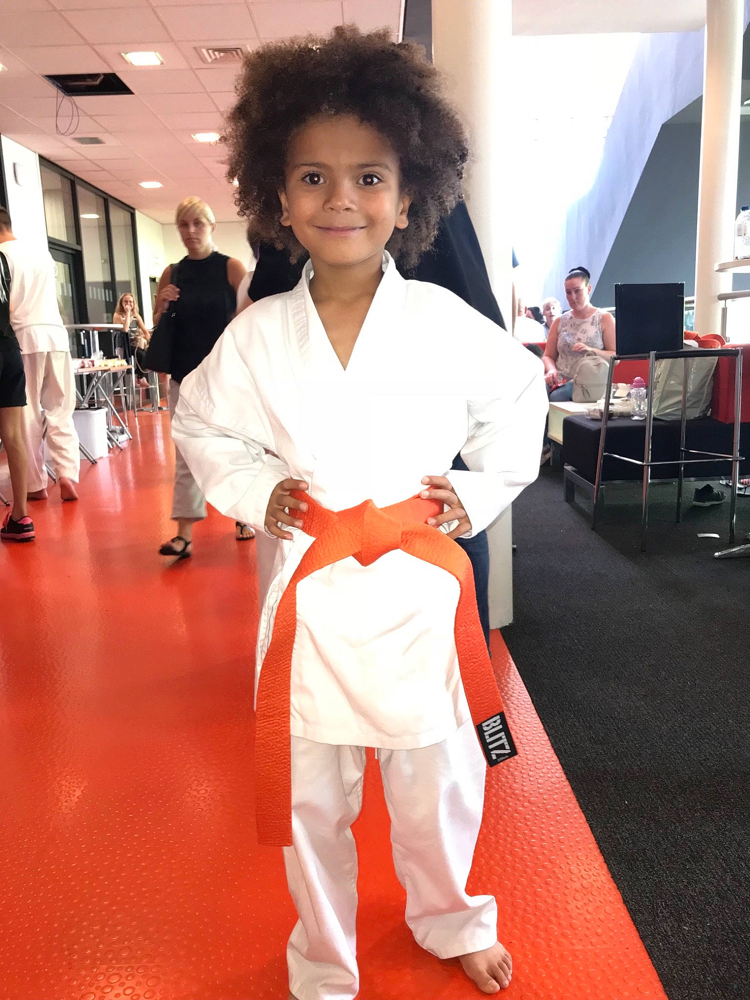 Fabian is registered to the contest to win money with this photo: beauty, black_belt, carpet, child, clothing, costume, dobok, fashion, flooring, girl, japanese_martial_arts, joy, karate, kimono, martial_arts, outerwear, person, red_carpet, taekwondo, tang_soo_do