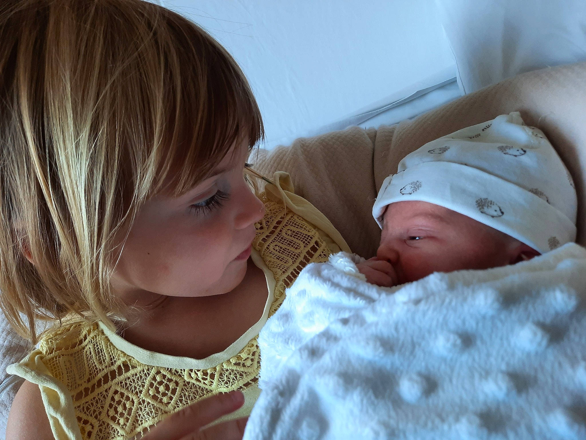 Eliza participe au concours pour gagner de l'argent avec cette photo : baby, baby_sleeping, baby_toddler_clothing, cheek, clothing, comfort, eye, eyelash, face, gesture, happy, head, human_body, linens, lip, mouth, nose, person, skin, smile