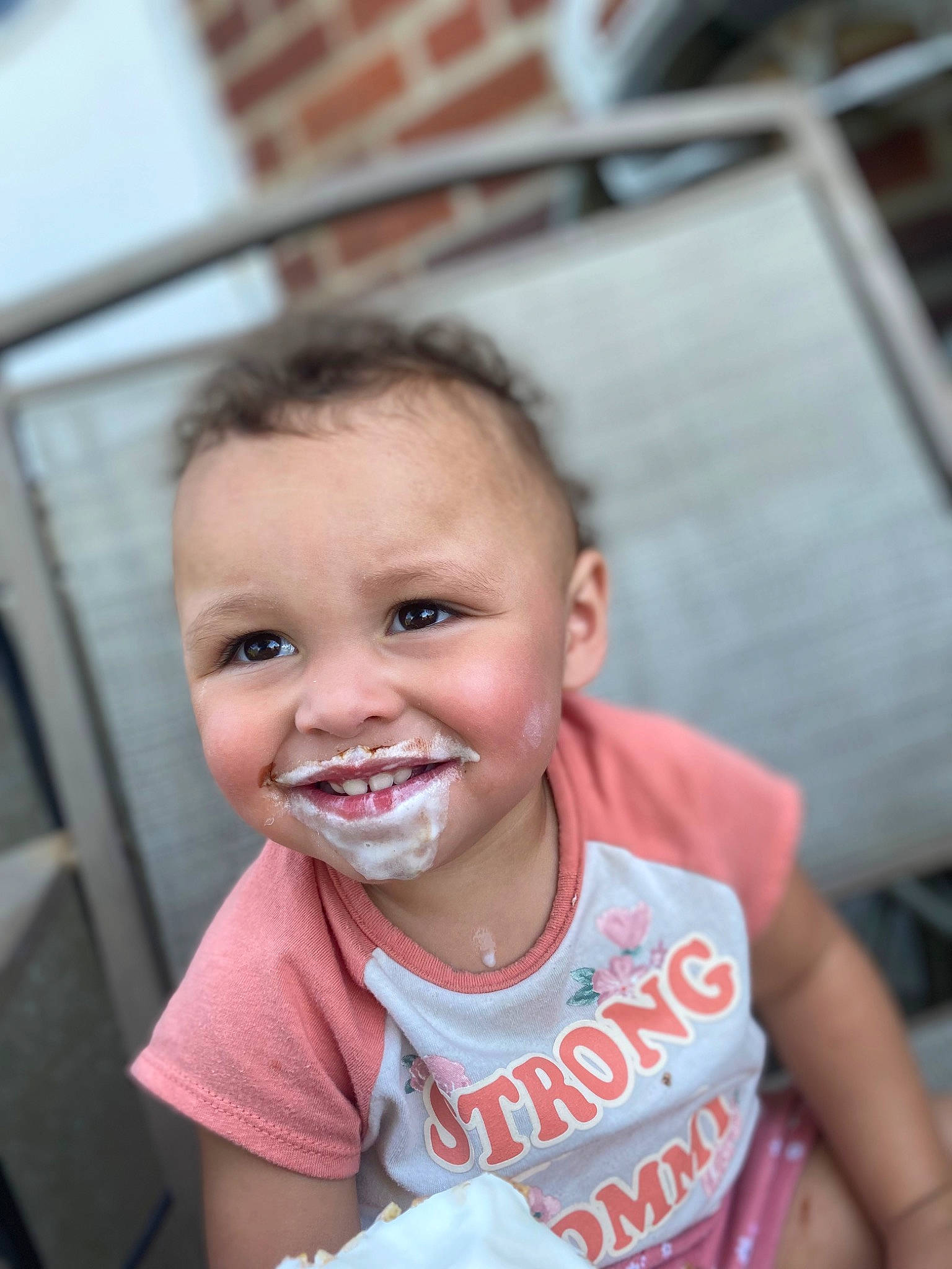 Karma is registered to the contest to win money with this photo: baby, baby_toddler_clothing, cheek, child, chin, event, eyebrow, eyelash, fun, gesture, happy, jaw, joy, lip, mouth, nose, person, skin, smile, t_shirt