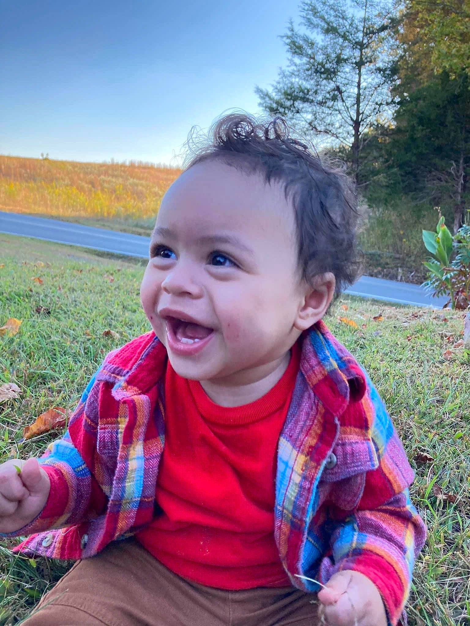 Zyaire is registered to the contest to win money with this photo: baby, baby_toddler_clothing, child, cool, fun, grass, grass_family, happy, head, iris, leisure, lip, nose, people_in_nature, person, plant, sitting, sky, smile, toddler