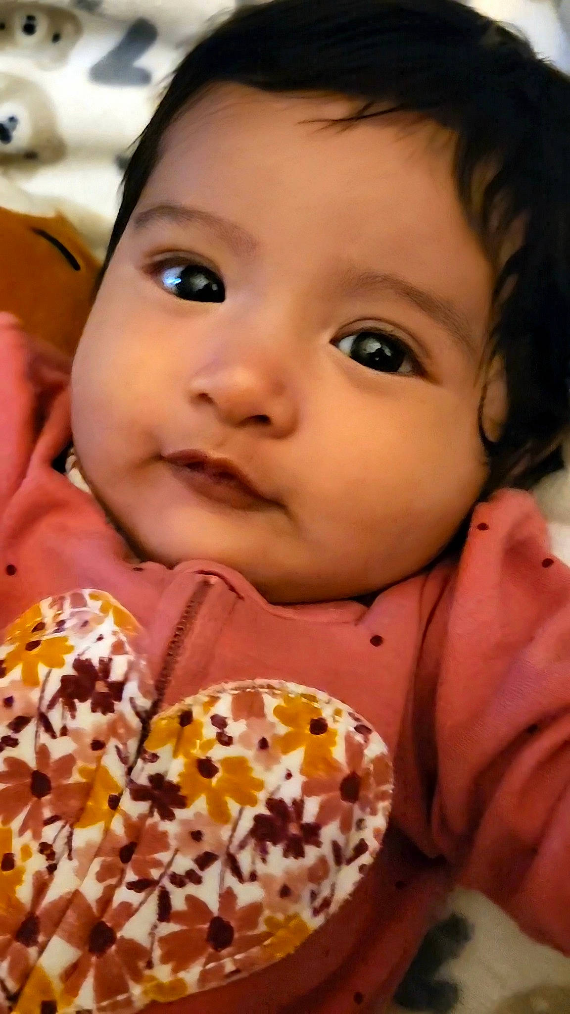 Sophia is registered to the contest to win money with this photo: baby, baby_toddler_clothing, cheek, child, chin, eyelash, face, fun, happy, lip, mouth, nail, nose, pattern, person, portrait_photography, skin, smile, sweetness, toddler