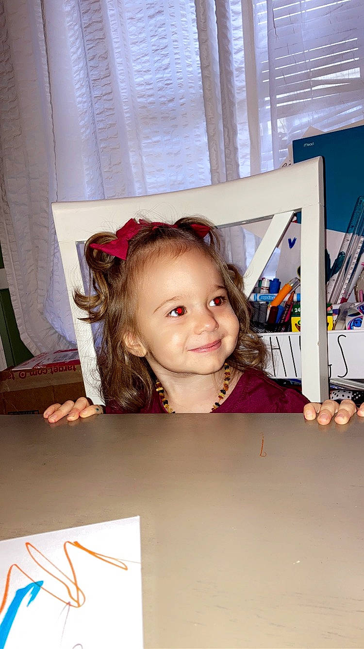 Estella joined the competition — help win amazing prizes! child, curtain, flooring, fun, happy, joy, leisure, magenta, person, portrait_photography, room, sitting, smile, t_shirt, toddler, vacation, visual_arts, wood