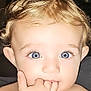 Lou joined the competition — help win amazing prizes! toddler, child, baby, face, blue_eyes, blonde_hair, curly_hair, fingers, hand, innocent, close_up, portrait, skin, person, young, cute, expression, human, indoor, soft_light