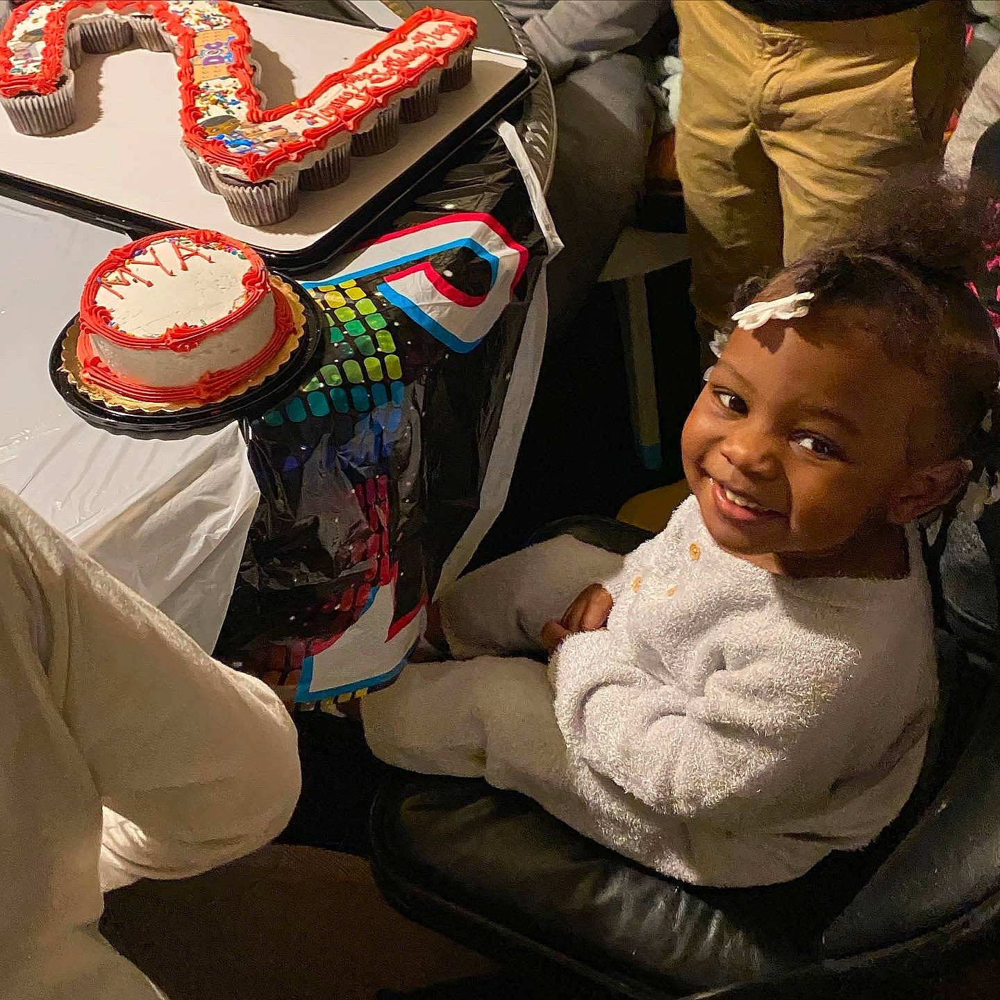 Amya joined the competition — help win amazing prizes! baby, child, comfort, elbow, event, facial_expression, fashion_accessory, fun, gesture, happy, human, joy, lap, mammal, pattern, person, sitting, smile, toddler, tradition