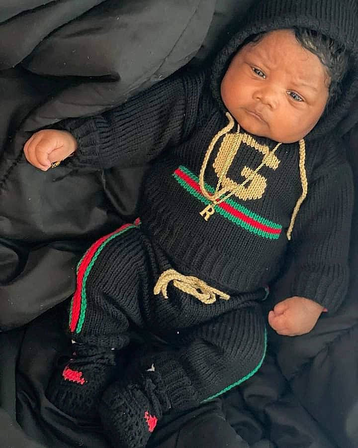 Royce joined the competition — help win amazing prizes! auto_part, baby, baby_products, baby_toddler_clothing, cap, car_seat, carmine, comfort, elbow, fashion_accessory, headwear, hood, knit_cap, person, personal_protective_equipment, sitting, sleeve, sportswear, toddler, tree