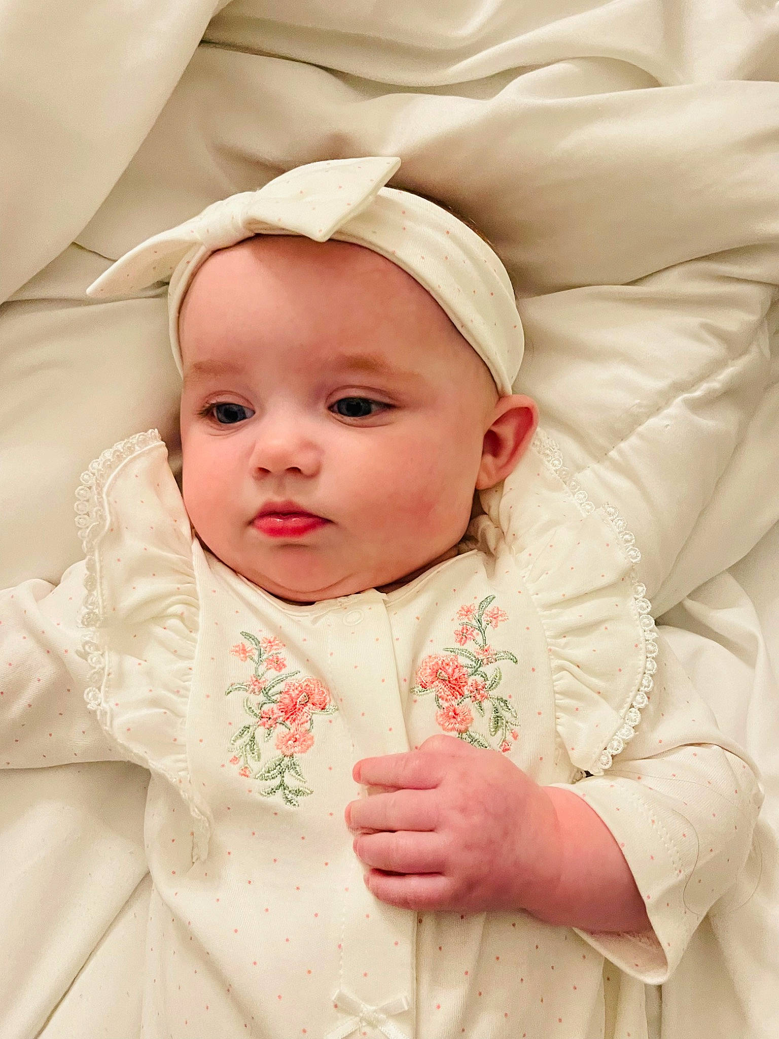 Presley is registered to the contest to win money with this photo: baby, baby_toddler_clothing, cheek, child, collar, comfort, event, eyebrow, face, facial_expression, gesture, happy, headgear, linens, lip, person, pink, skin, sleeve, toddler