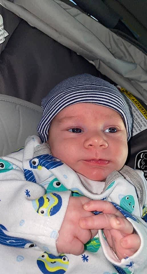 Justin Ryker joined the competition — help win amazing prizes! baby, baby_carriage, baby_products, baby_toddler_clothing, car_seat, cheek, child, comfort, finger, happy, hat, headwear, linens, nail, person, product, sitting, skin, smile, thumb