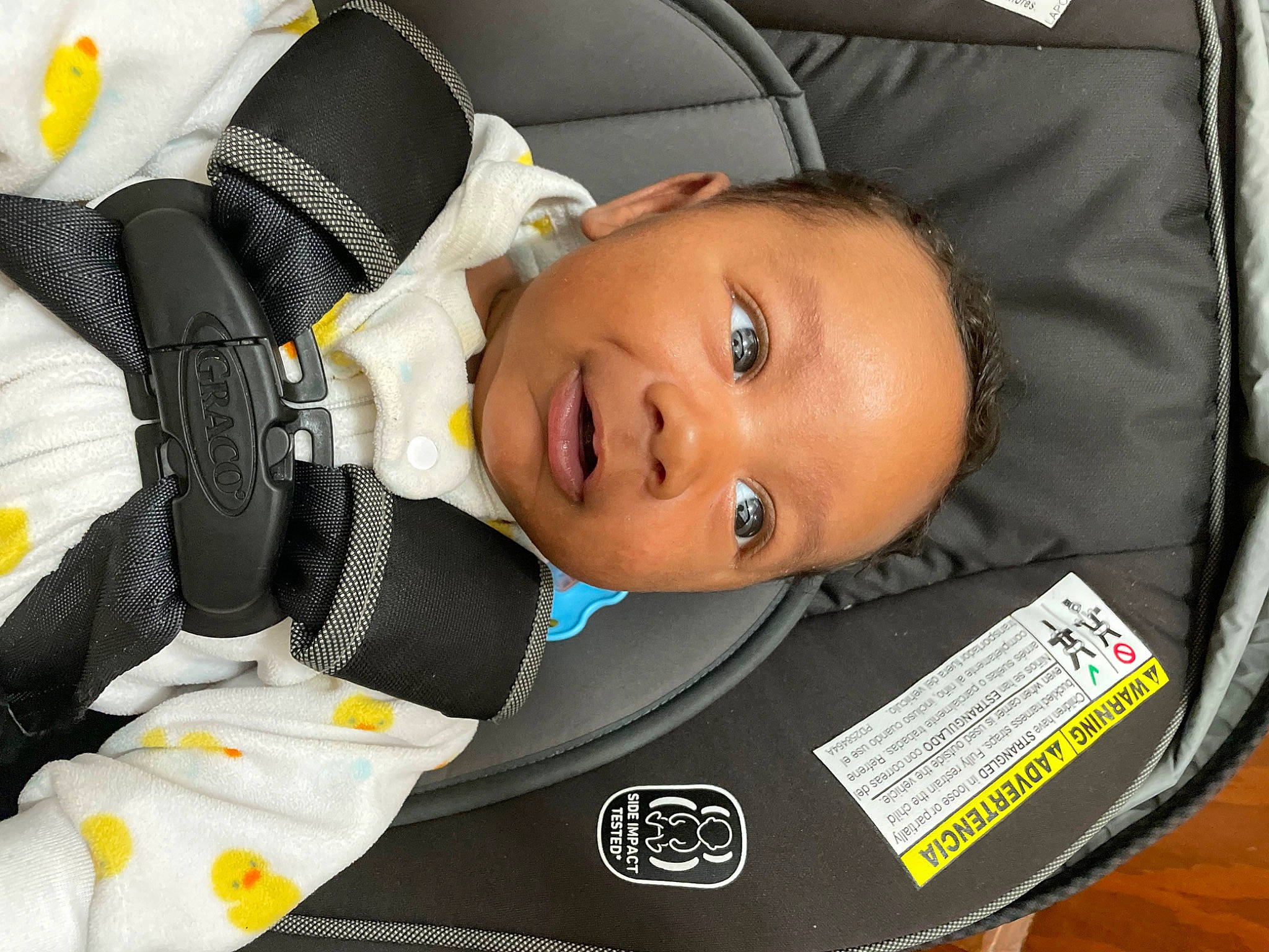 Asiah is registered to the contest to win money with this photo: auto_part, baby, baby_carriage, baby_in_car_seat, baby_products, baby_safety, baby_toddler_clothing, car_seat, child, comfort, fashion_accessory, person, personal_protective_equipment, toddler, vehicle_door, yellow