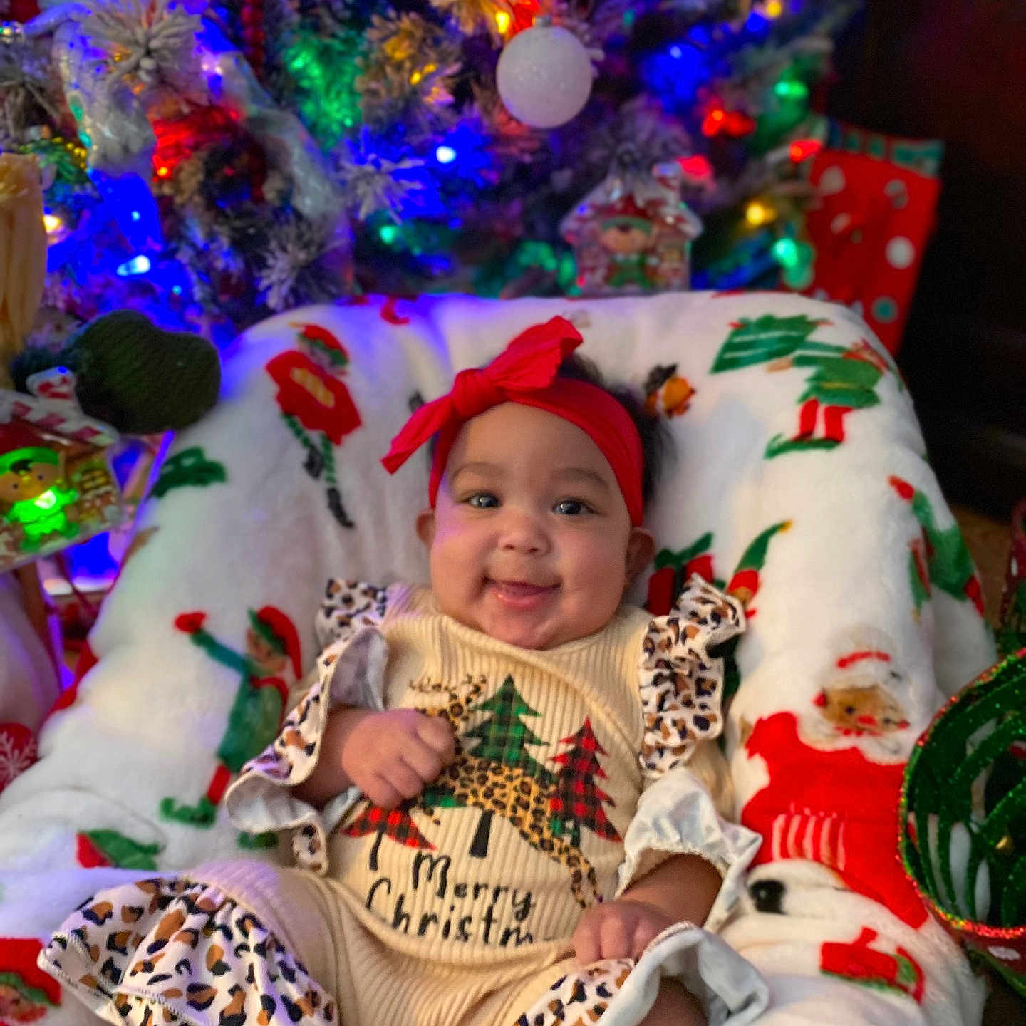 Emrie is registered to the contest to win money with this photo: architecture, baby, building, cap, clothing, couch, cushion, face, furniture, hat, head, homedecor, indoors, lighting, livingroom, person, photography, plant, portrait, room