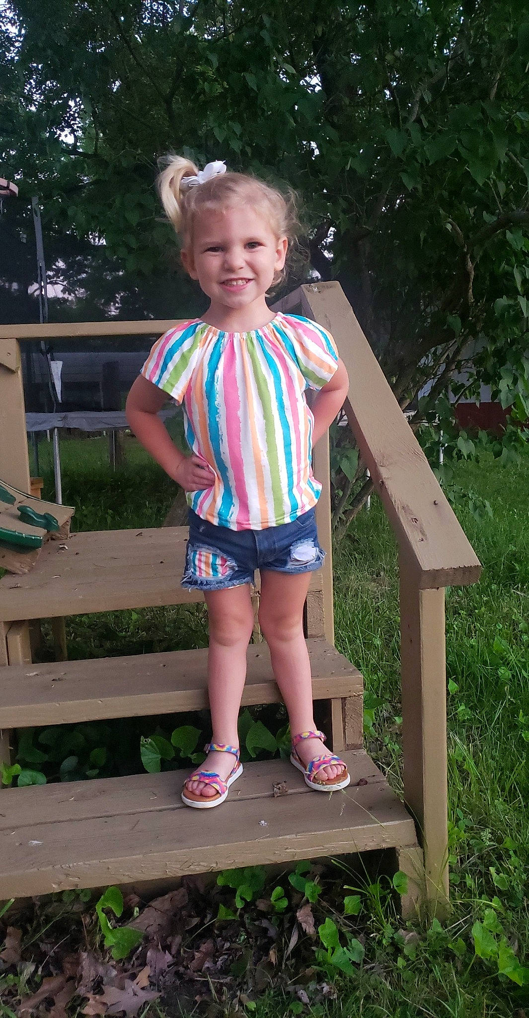 Sutton is registered to the contest to win money with this photo: baby_toddler_clothing, child, fun, grass, green, happy, joy, leisure, pattern, people_in_nature, person, pink, plant, recreation, shorts, sleeve, standing, summer, t_shirt, toddler