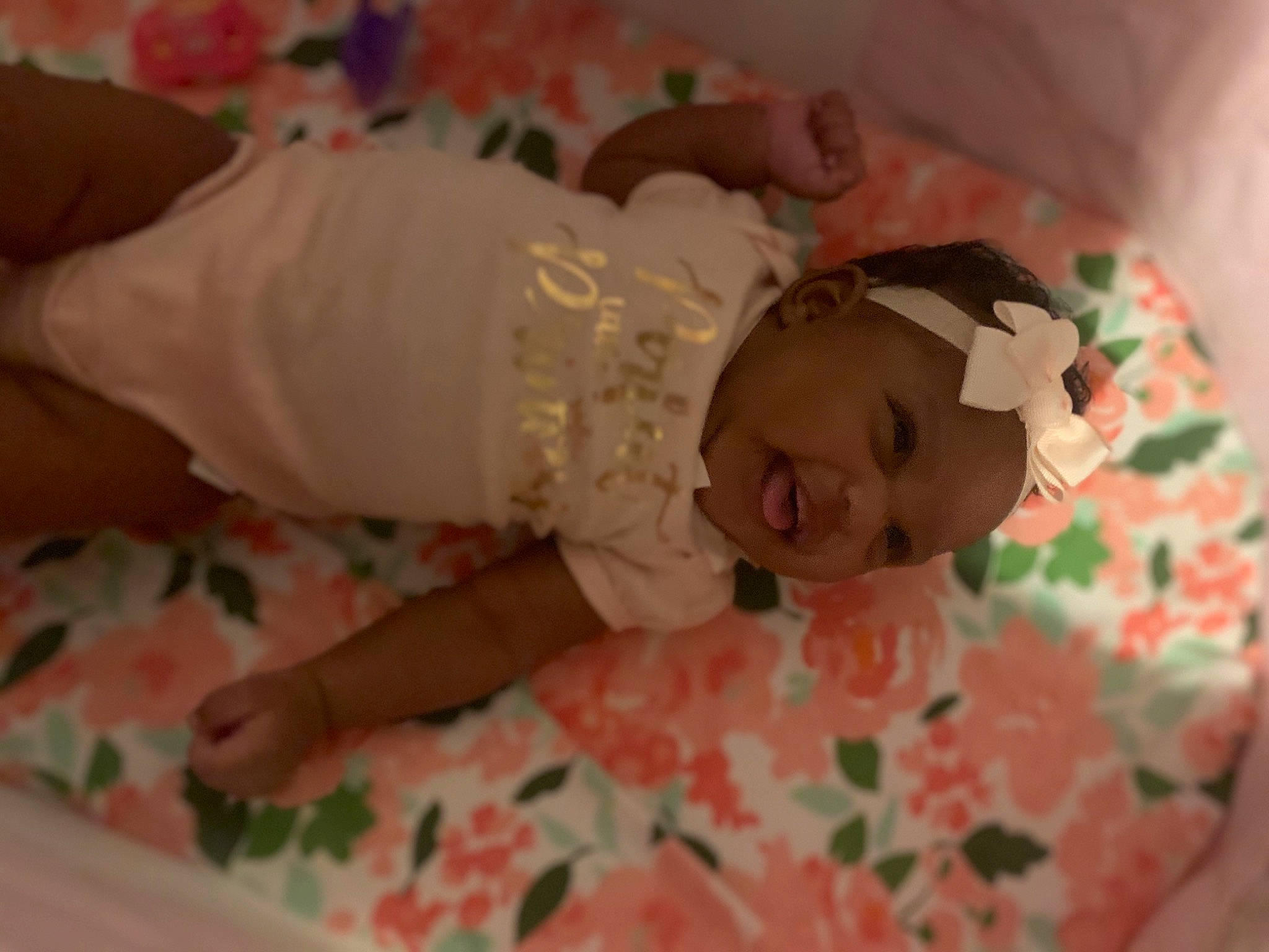 Marcella is registered to the contest to win money with this photo: baby, baby_products, bed, bedtime, child, headwear, infant_bed, nap, person, pink, product, room, skin, sleep, textile, toddler