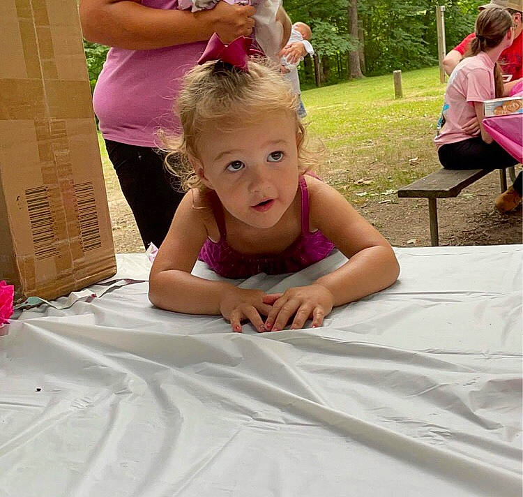 Raven joined the competition — help win amazing prizes! baby, baby_toddler_clothing, chair, child, clothing, event, fun, grass, happy, leisure, magenta, person, pink, plant, recreation, shorts, summer, sunglasses, t_shirt, toddler