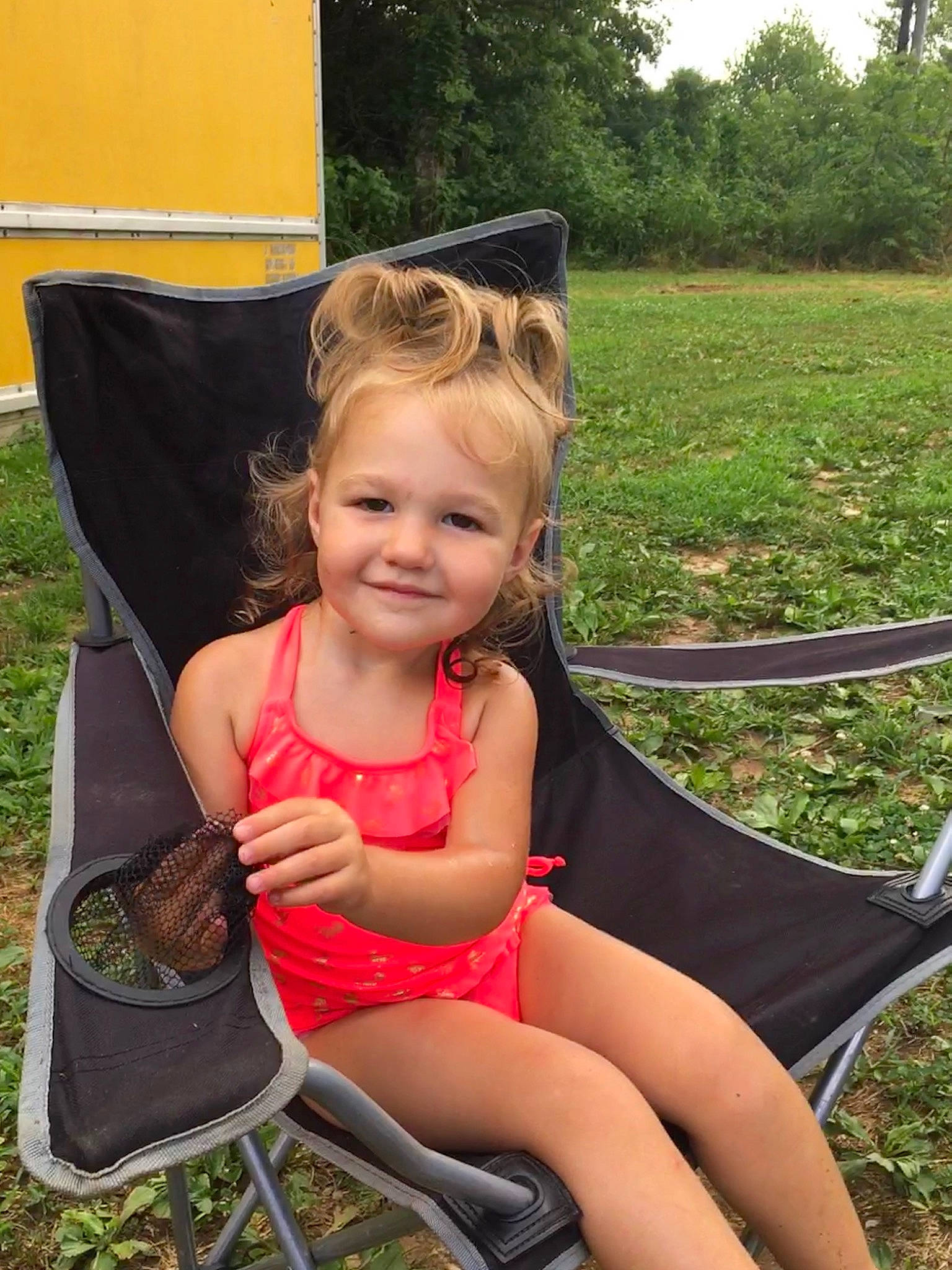 Raven joined the competition — help win amazing prizes! chair, child, eyewear, fun, grass, hair, hairstyle, happy, human_leg, joy, lap, leisure, people_in_nature, person, plant, recreation, sitting, smile, summer, thigh