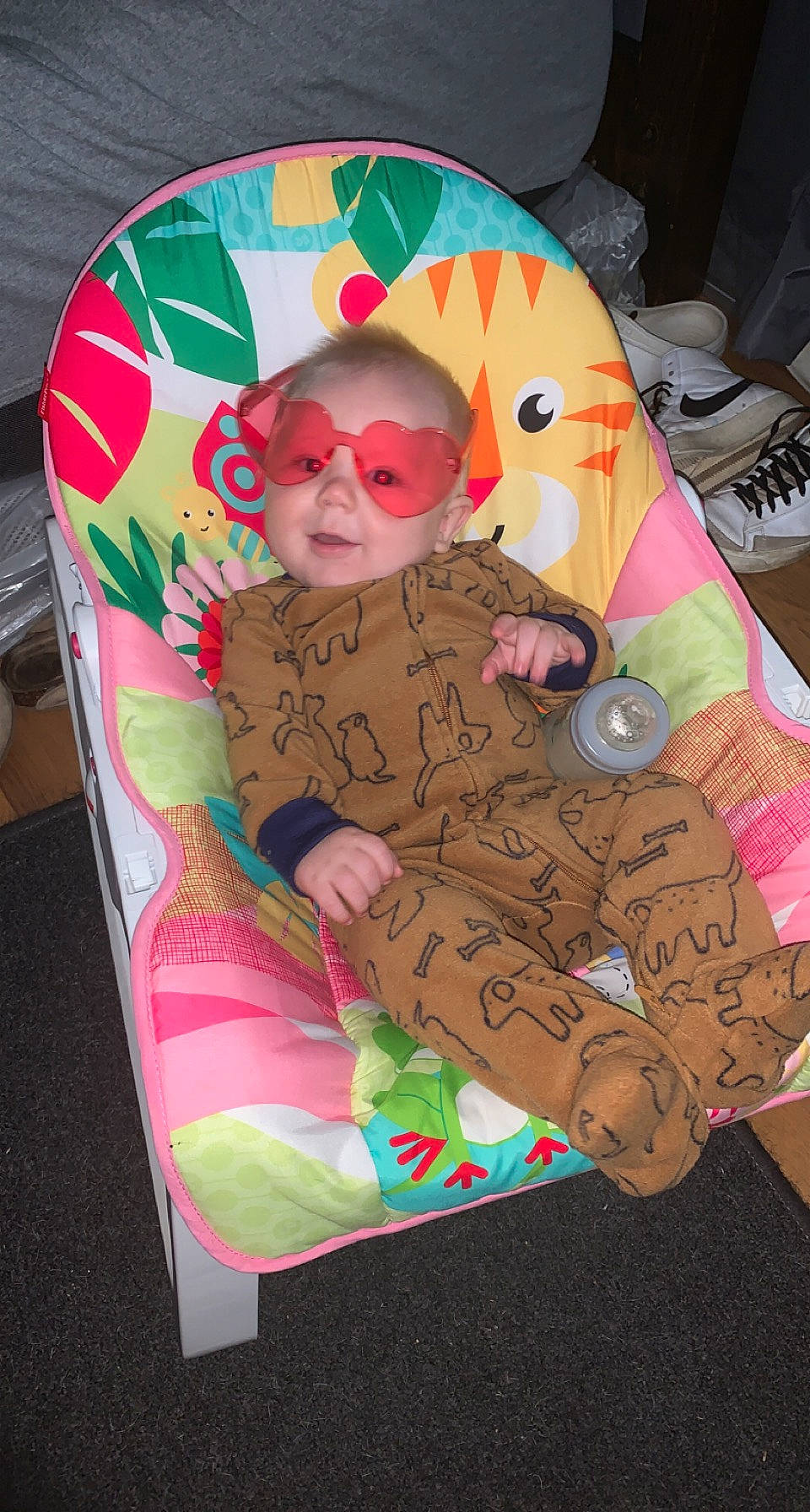 Haiden is registered to the contest to win money with this photo: baby, baby_products, baby_toddler_clothing, carmine, child, eyewear, linens, magenta, paper, paper_product, pattern, person, pink, sitting, sunglasses, toddler, visual_arts