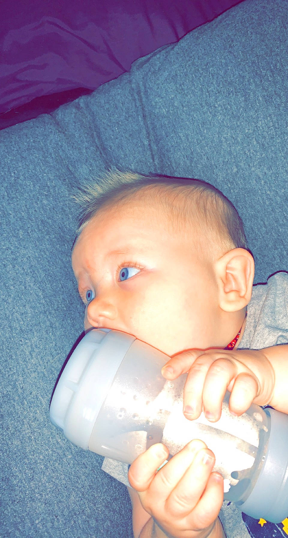 Haiden is registered to the contest to win money with this photo: baby, baby_bottle, baby_products, baby_toddler_clothing, blue, cheek, child, drinkware, eyelash, finger, hand, head, helmet, mouth, nail, nose, person, plastic_bottle, skin, thumb