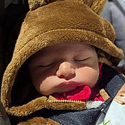 Archer joined the competition — help win amazing prizes! animal_print, antlers, baby, blanket, brown, bundle, child, closeup, clothing, cozy, cute, face, hood, infant, nap, peaceful, portrait, sleeping, soft, warm