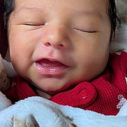 Archer joined the competition — help win amazing prizes! baby, infant, sleeping, face, blanket, red_clothing, close_up, soft_texture, peaceful, newborn, cute, mouth, skin, head, eyelids, nostrils, hair, warm, comfort, portrait