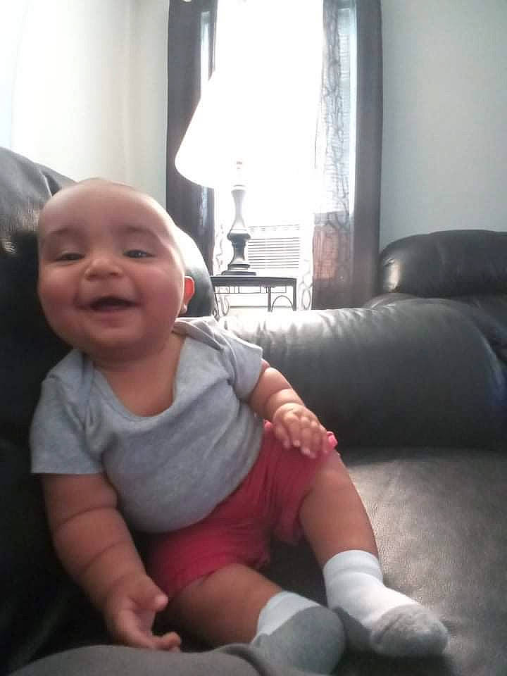 Azazel joined the competition — help win amazing prizes! arm, baby, baby_toddler_clothing, comfort, couch, curtain, floor, flooring, human_leg, knee, lamp, leg, person, skin, sleeve, smile, thigh, thumb, toddler, window