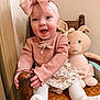 Emma joined the competition — help win amazing prizes! baby, child, pink_bow, blue_eyes, smiling, knitted_toy, bunny, plush, chair, woven_chair, wooden_chair, tights, white_tights, dress, pink_sweater, happy, cute, indoors, portrait, person