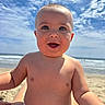 baby, child, smiling, beach, ocean, sky, clouds, sunny, bare_chested, diaper, happy, portrait, cute, outdoor, summer, water, nature, sand, person, infant