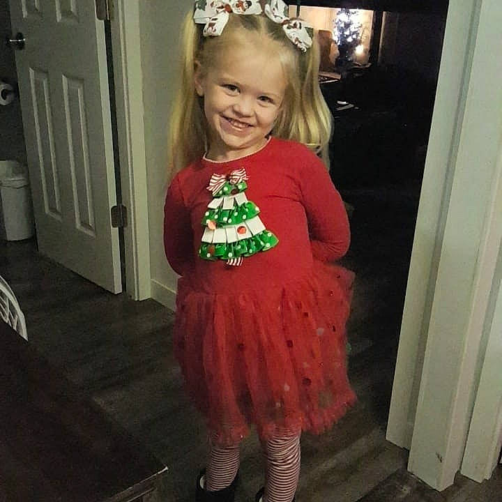 Mollie joined the competition — help win amazing prizes! baby_toddler_clothing, clothing, cool, door, dress, eye, face, hair, hairstyle, happy, head, iris, joy, leg, person, photograph, pink, sleeve, smile, standing