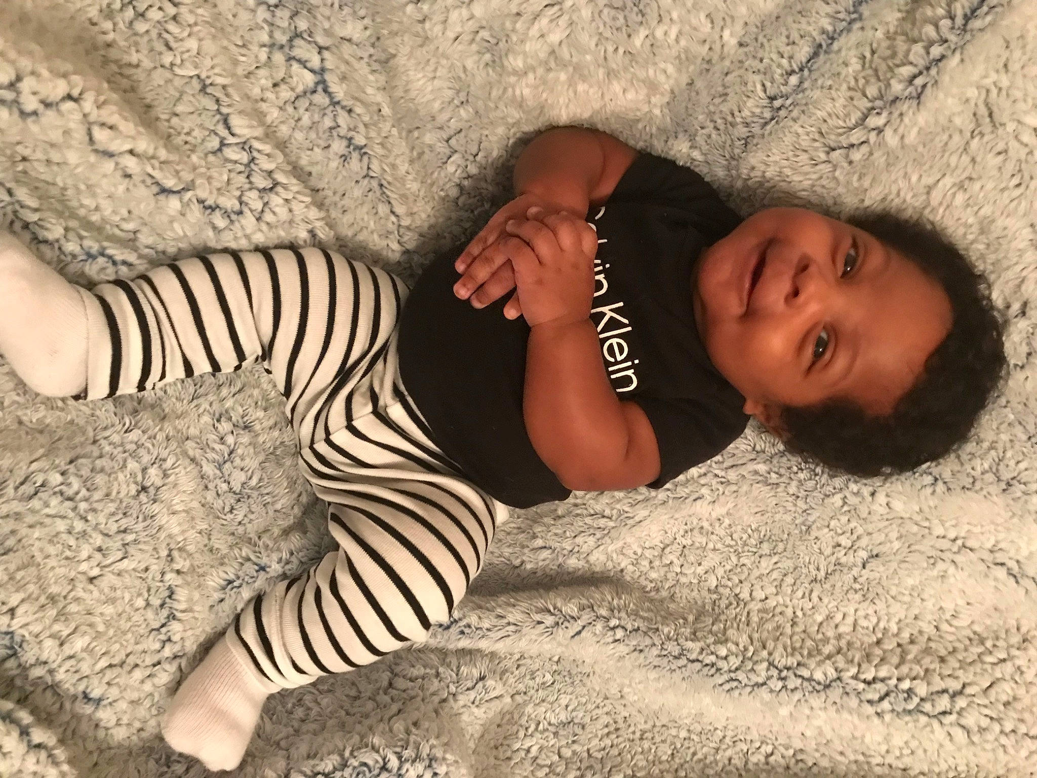 Messiah is registered to the contest to win money with this photo: adaptation, arm, comfort, eye, face, fawn, finger, hairstyle, hand, head, human_body, joint, joy, leg, mammal, neck, people_in_nature, person, skin, tree