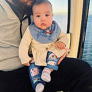 Luna is registered to the contest to win money with this photo: baby, man, beard, bib, pants, socks, window, sea, water, indoor, person, clothing, holding, cute, child, portrait, casual, parent, babywear, transport