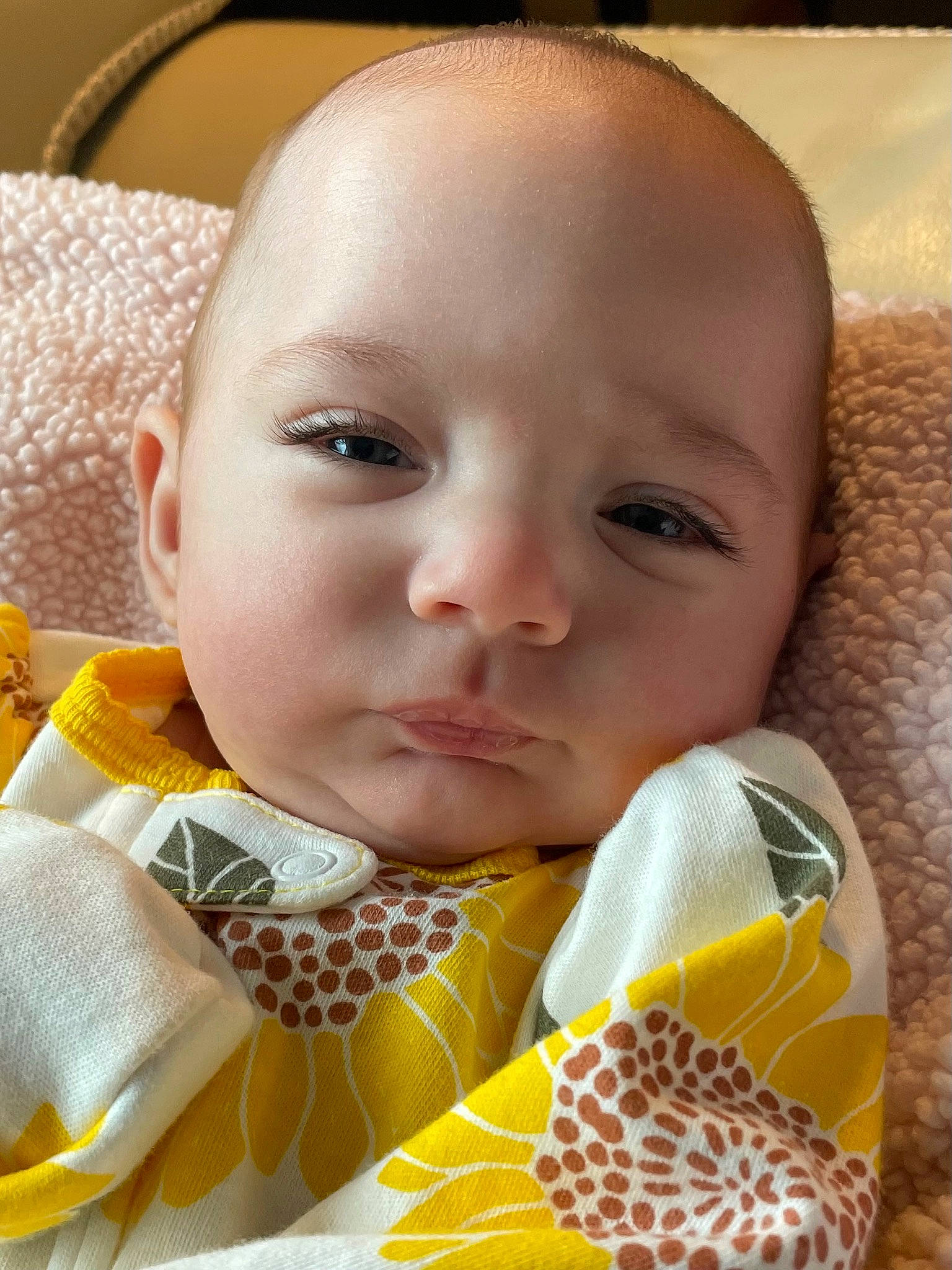 Antonella is registered to the contest to win money with this photo: baby, baby_toddler_clothing, cheek, child, chin, close_up, collar, comfort, eyelash, happy, head, iris, linens, nose, pattern, person, skin, textile, toddler, white