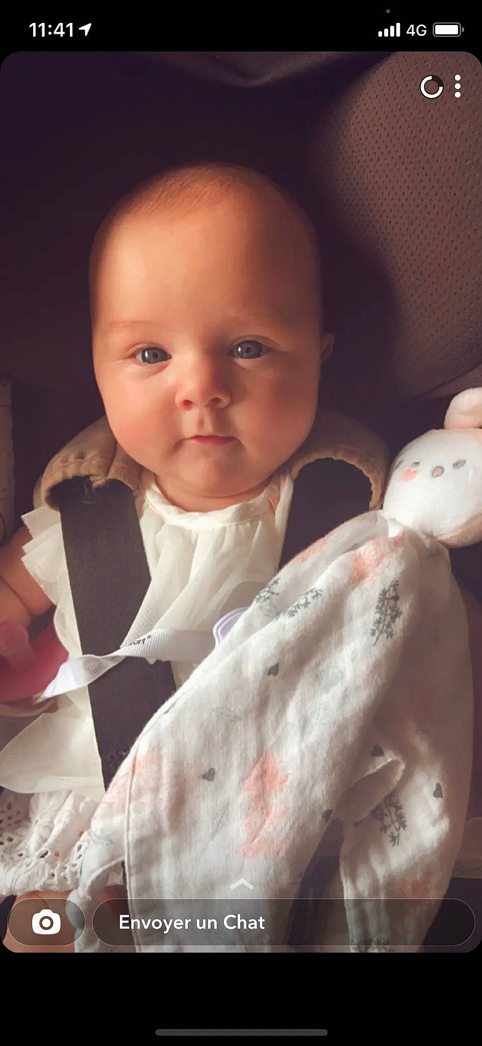 Juliette participe au concours pour gagner de l'argent avec cette photo : baby, baby_products, baby_toddler_clothing, cheek, chest, child, comfort, event, formal_wear, gesture, happy, iris, linens, lip, nose, person, sitting, skin, sleeve, thumb