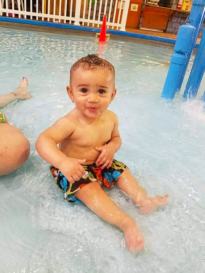 Dane is registered to the contest to win money with this photo: amusement_park, bathing, child, fun, leisure, leisure_centre, nonbuilding_structure, person, play, product, recreation, summer, swimming_pool, toddler, vacation, water_park