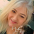 Lynda E.