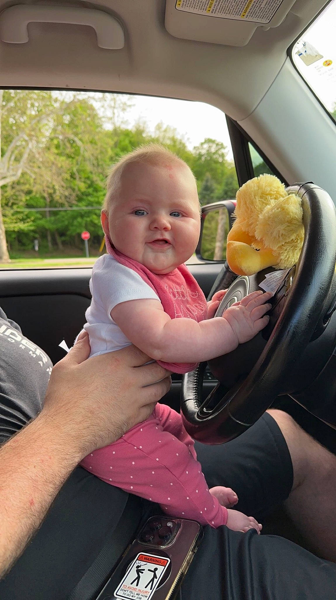 Liana joined the competition — help win amazing prizes! auto_part, automotive_design, automotive_exterior, baby, baby_toddler_clothing, car, car_seat, comfort, finger, gesture, hand, happy, motor_vehicle, person, plant, smile, thumb, toddler, tree, vehicle_door