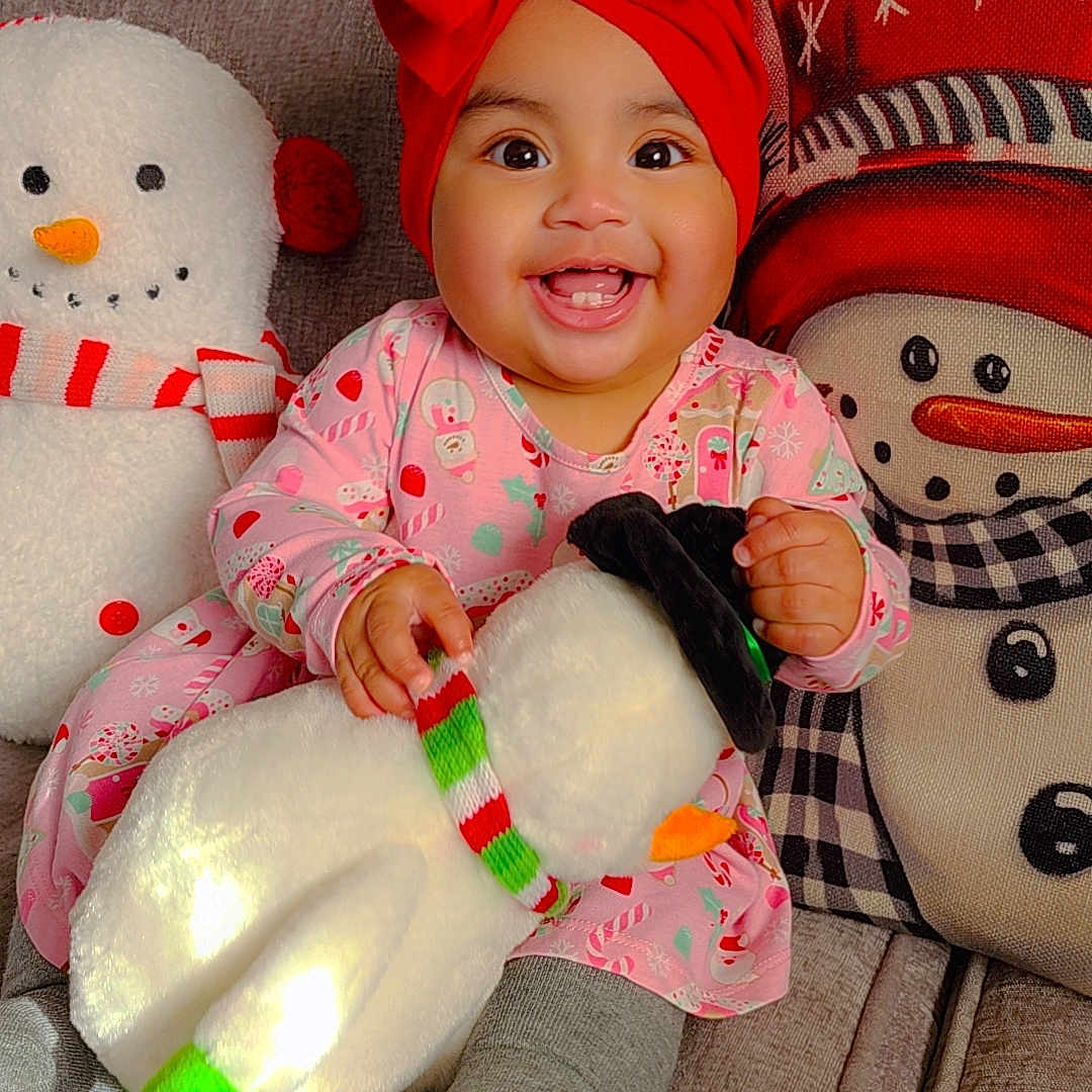 Marcelina joined the competition — help win amazing prizes! baby, bodypart, clothing, couch, cushion, face, finger, furniture, glove, hat, head, homedecor, hosiery, nature, outdoors, person, photography, portrait, sock, winter