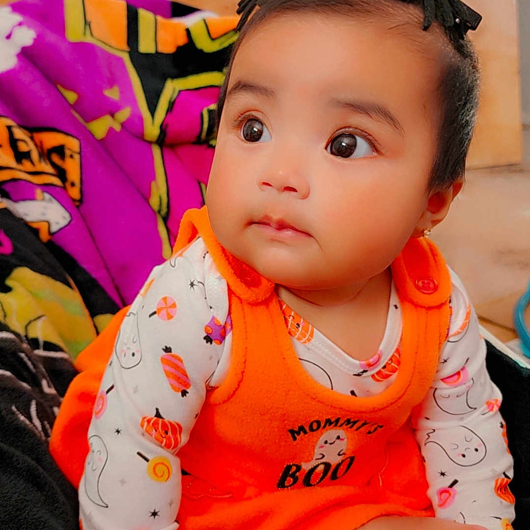 Marcelina joined the competition — help win amazing prizes! accessories, applique, baby, bodypart, clothing, couch, dress, face, finger, furniture, hand, happy, head, headband, pattern, person, photography, portrait, sitting, toy