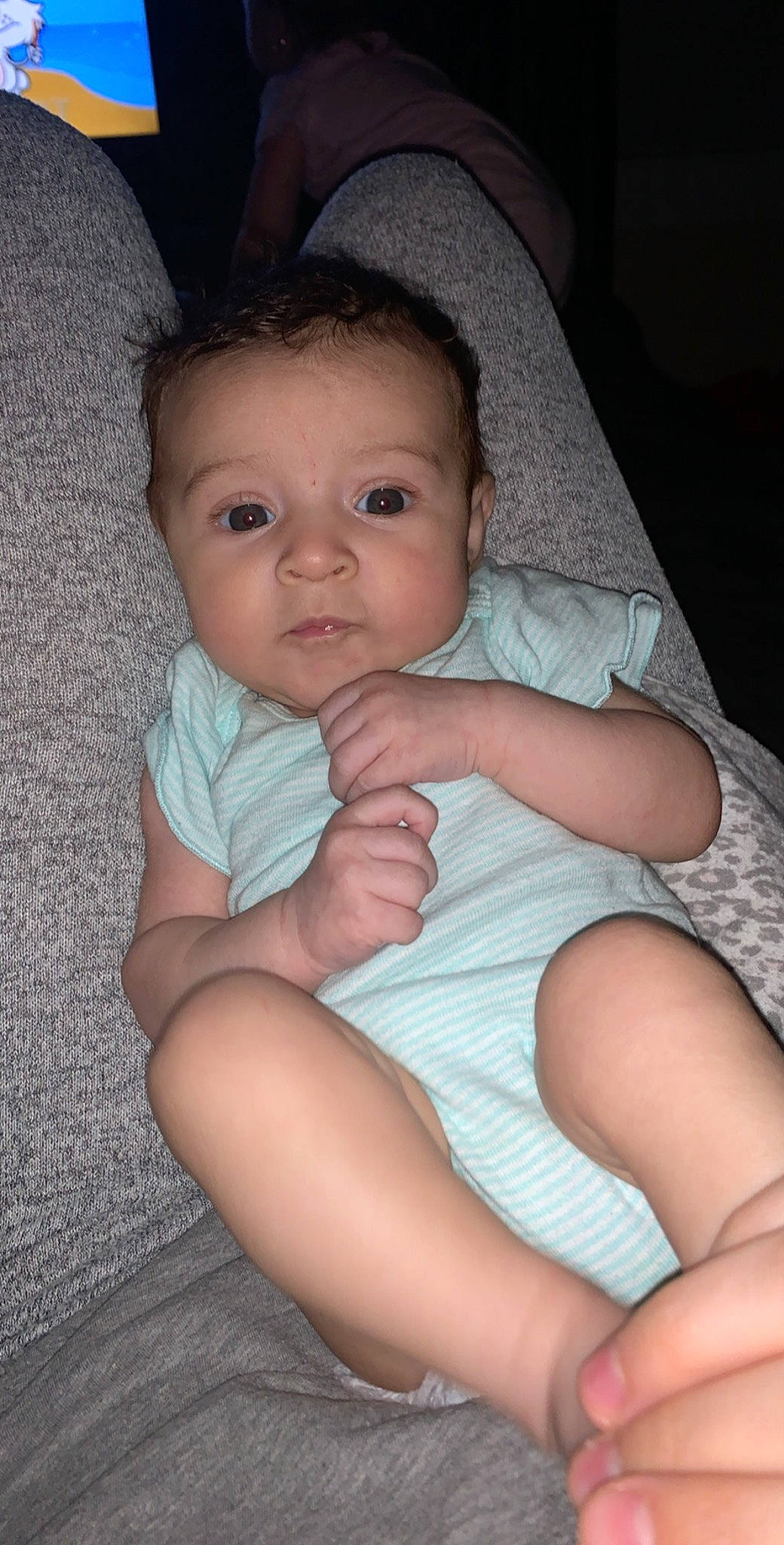 Serayah is registered to the contest to win money with this photo: arm, baby, cheek, child, chin, eye, face, finger, head, iris, leg, lip, mouth, nose, person, sitting, skin, smile, toddler