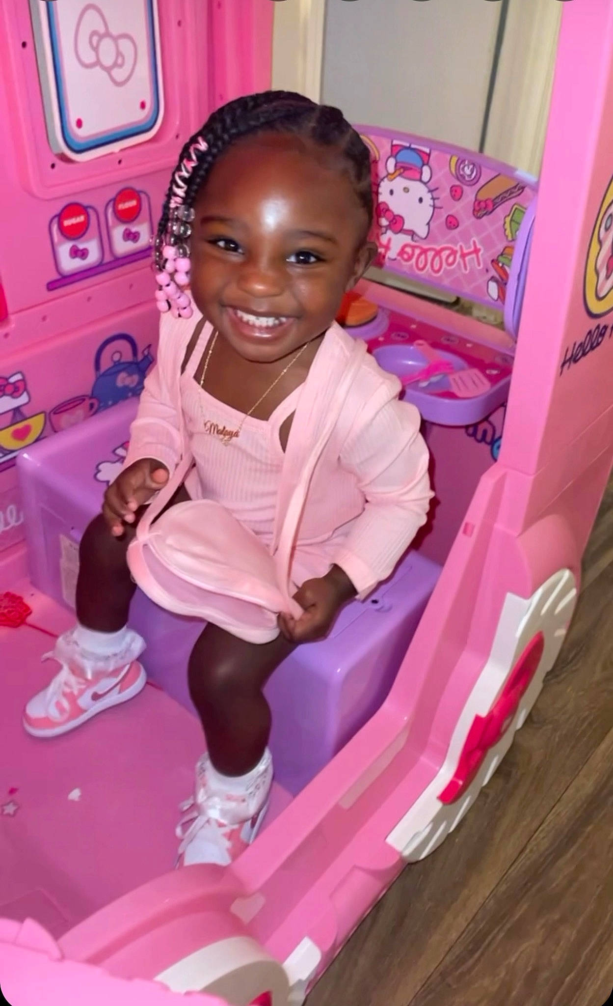 Malaya joined the competition — help win amazing prizes! baby, child, flooring, fun, happy, joy, leisure, magenta, person, pink, play, purple, recreation, room, sitting, skin, smile, sneakers, tire, toddler