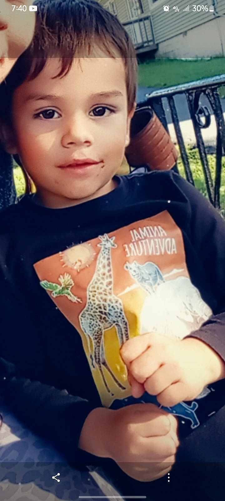 Josiah is registered to the contest to win money with this photo: blue, chest, child, finger, flash_photography, fun, hand, happy, human_leg, leisure, nail, neck, organ, person, skin, t_shirt, thumb, toddler, tree, trunk