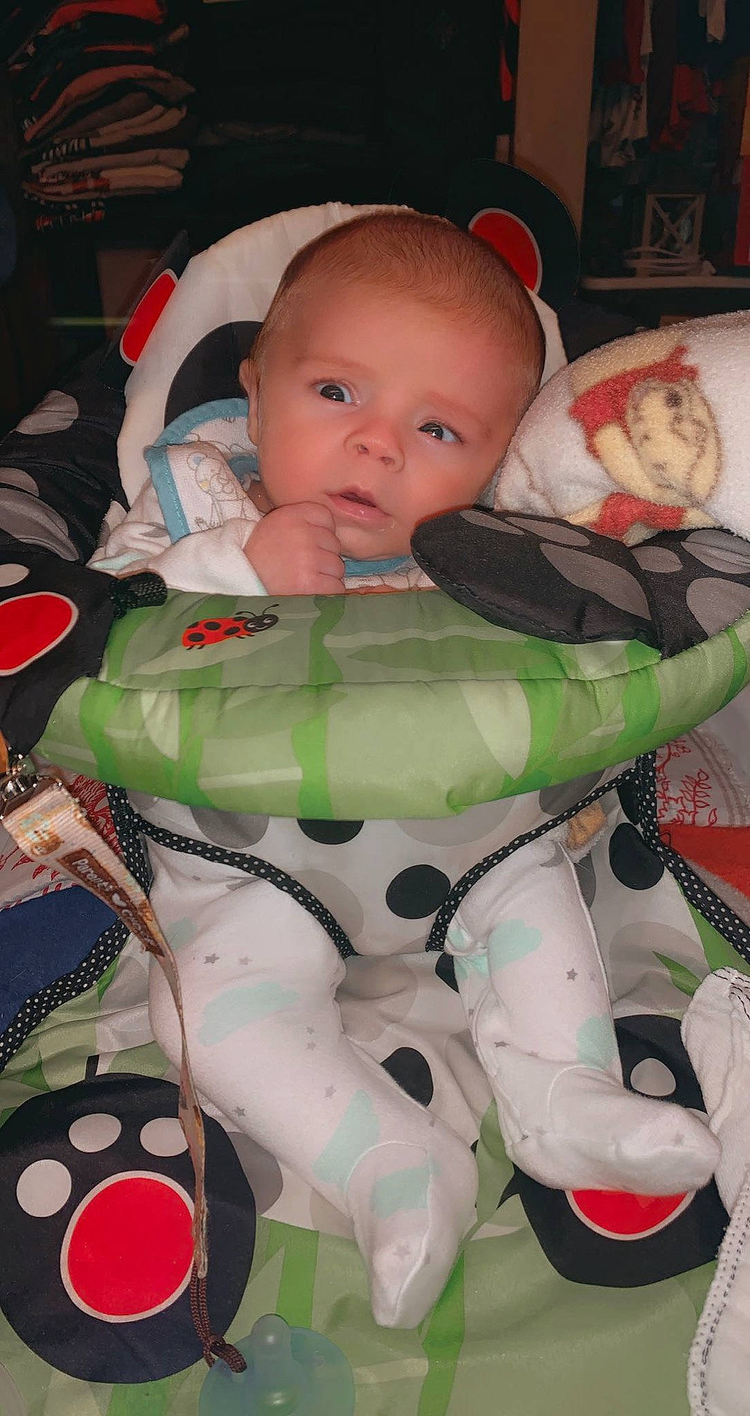 Joey is registered to the contest to win money with this photo: baby, baby_carriage, baby_products, baby_safety, baby_toddler_clothing, carmine, chair, cheek, child, comfort, event, fictional_character, fun, mouth, pattern, person, personal_protective_equipment, sitting, skin, toddler