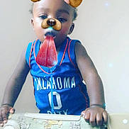 Malik is registered to the contest to win money with this photo: action_figure, animation, arm, blue, cartoon, child, cool, eyewear, facial_hair, figurine, glasses, jersey, muscle, outerwear, photography, sportswear, sunglasses, t_shirt, top, toy