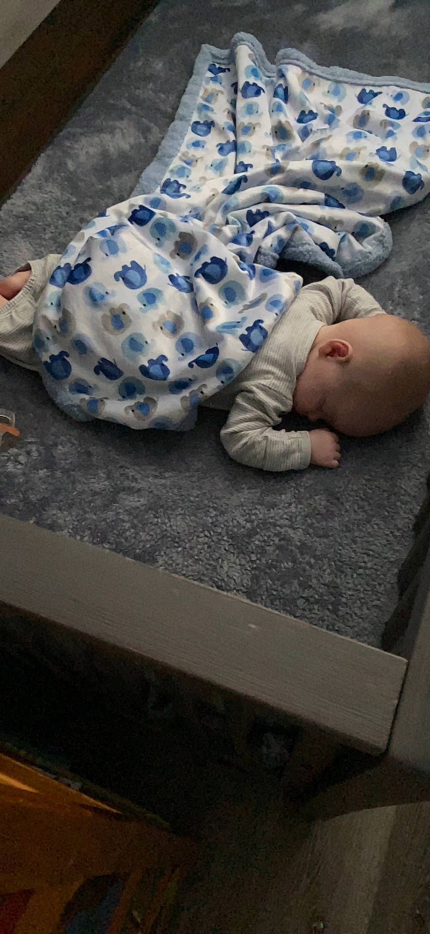 Brysen is registered to the contest to win money with this photo: baby, baby_toddler_clothing, barefoot, child, comfort, finger, flooring, foot, grass, grey, human_leg, linens, mammal, pattern, plastic_bag, shoe, sitting, toddler, vertebrate, wall