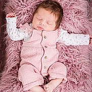 Alessia participe au concours pour gagner de l'argent avec cette photo : baby, newborn, infant, sleeping, pink, onesie, wooden_floor, faux_fur, blanket, bed, portrait, cute, closed_eyes, peaceful, toes, hand, clothing, cozy, studio_photography, buttoned_clothing