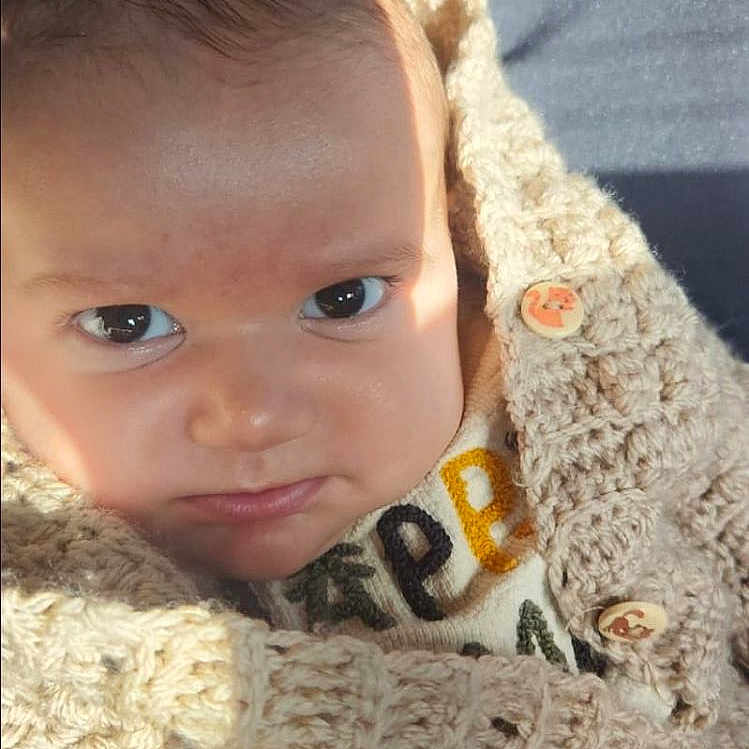 Amir a rejoint le concours — aidez-le/la à gagner de superbes lots ! accessories, baby, blanket, clothing, coat, cushion, face, happy, head, homedecor, jacket, knitwear, newborn, person, photography, portrait, smile, sweater, teddybear, toy