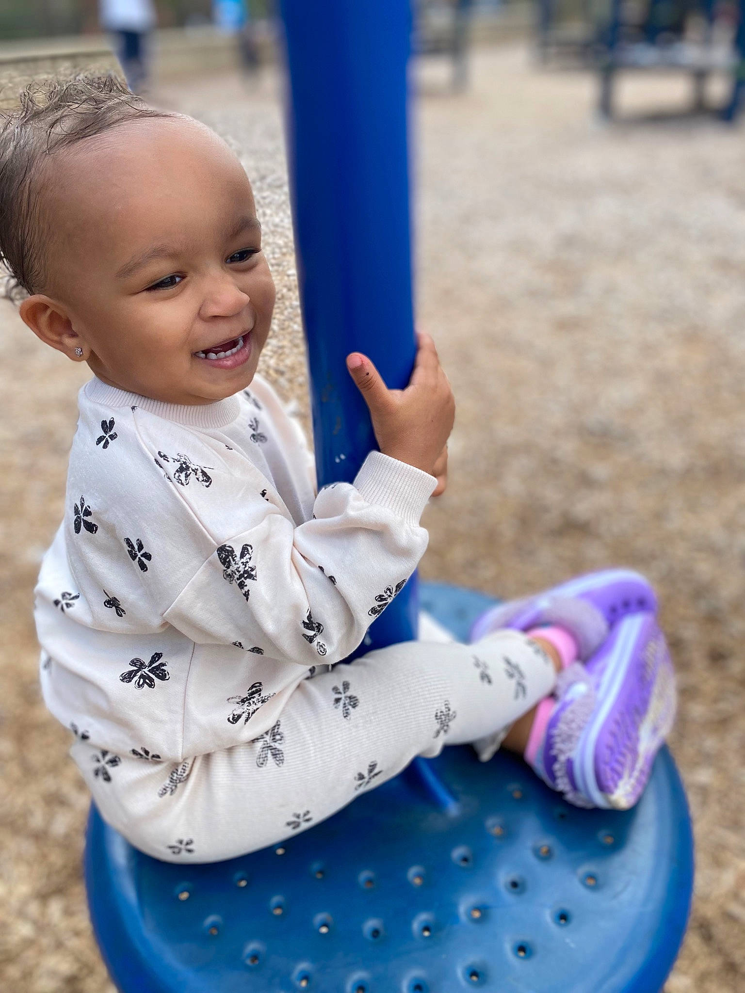 Jayanna is registered to the contest to win money with this photo: arm, baby, baby_toddler_clothing, beauty, blue, city, facial_expression, fun, grass, hair, happy, leisure, mammal, person, plant, playground, recreation, sleeve, smile, toddler