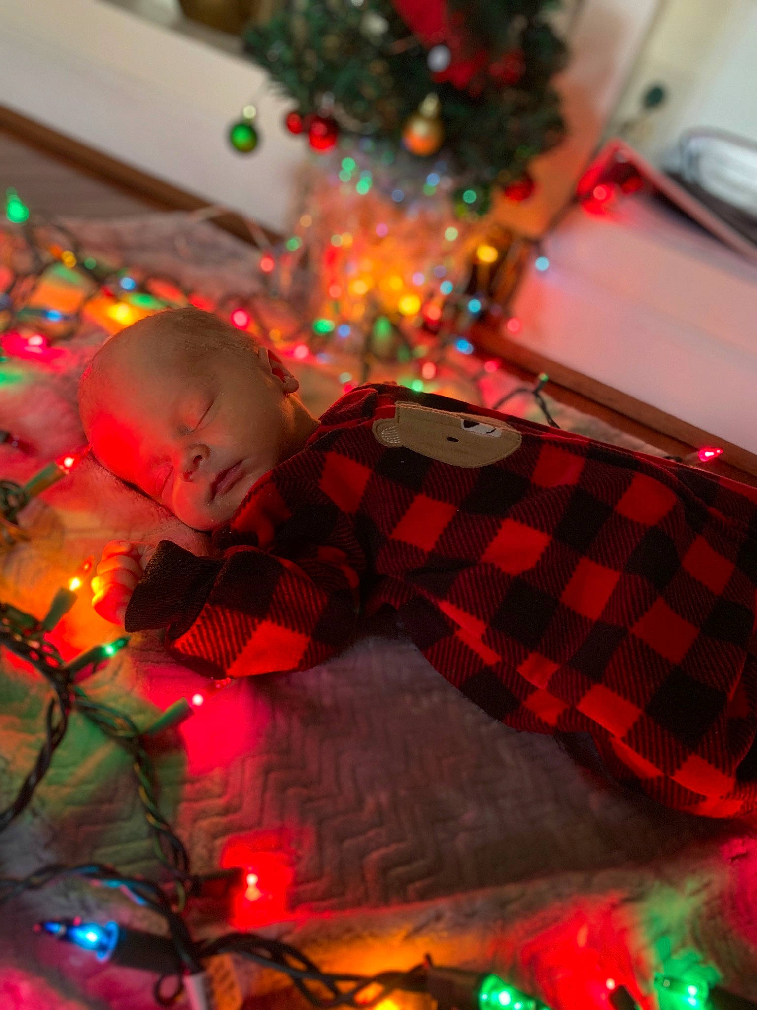 Brenton joined the competition — help win amazing prizes! automotive_lighting, christmas, christmas_decoration, christmas_ornament, christmas_tree, event, fun, happy, holiday, holiday_ornament, light, magenta, ornament, person, plant, purple, red, snapshot, toddler, tree