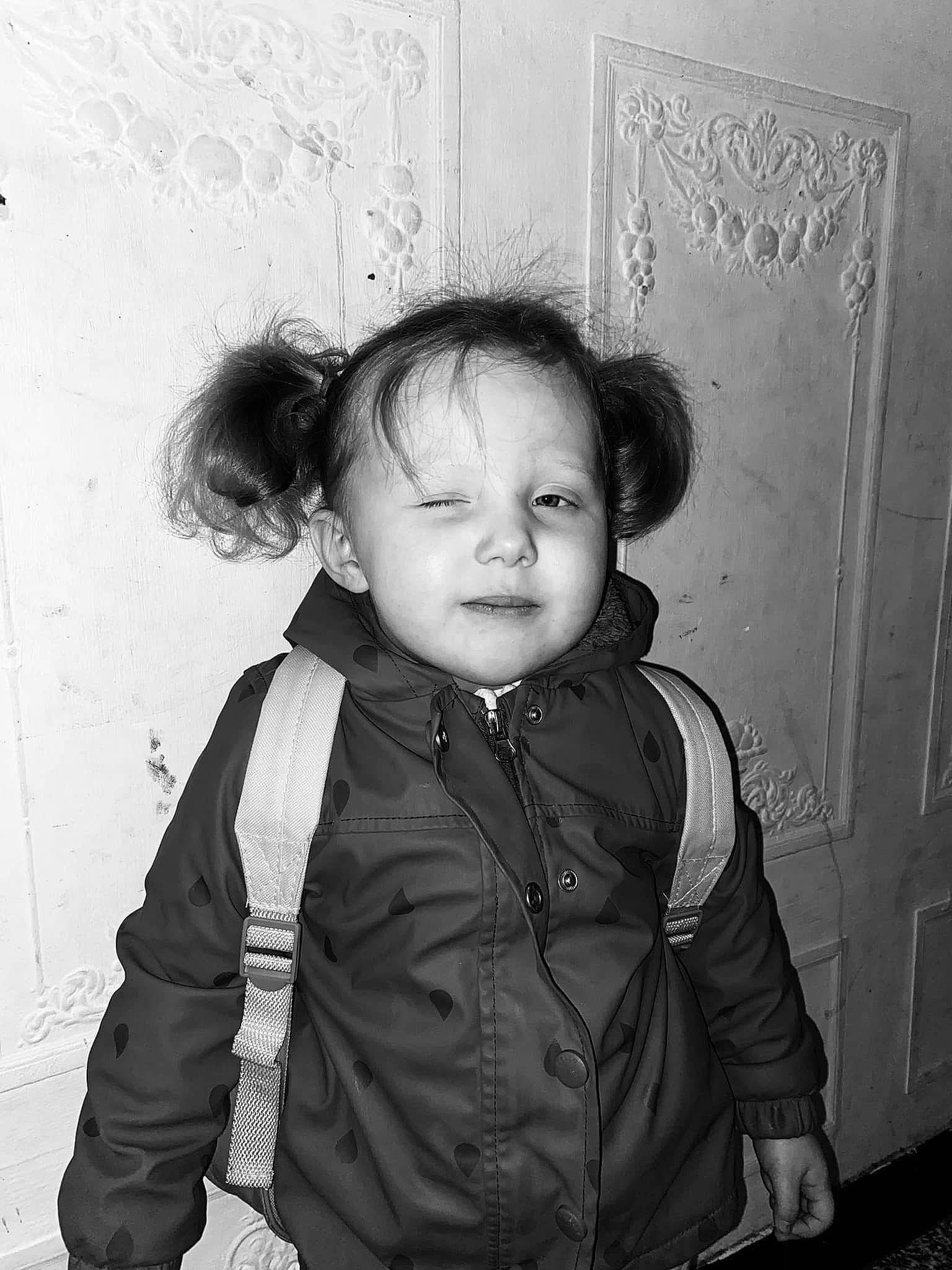 Sawyer participe au concours pour gagner de l'argent avec cette photo : black, black_and_white, cheek, eyebrow, flash_photography, fun, hairstyle, happy, jacket, monochrome, monochrome_photography, nose, outerwear, person, photograph, sleeve, snapshot, standing, style, toddler