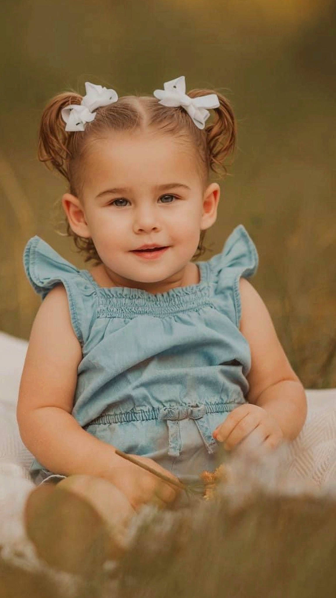 Ellie joined the competition — help win amazing prizes! baby, baby_toddler_clothing, cheek, child, chin, eye, flash_photography, grass, happy, head, headband, headpiece, iris, joy, lip, person, plant, sitting, skin, sleeve