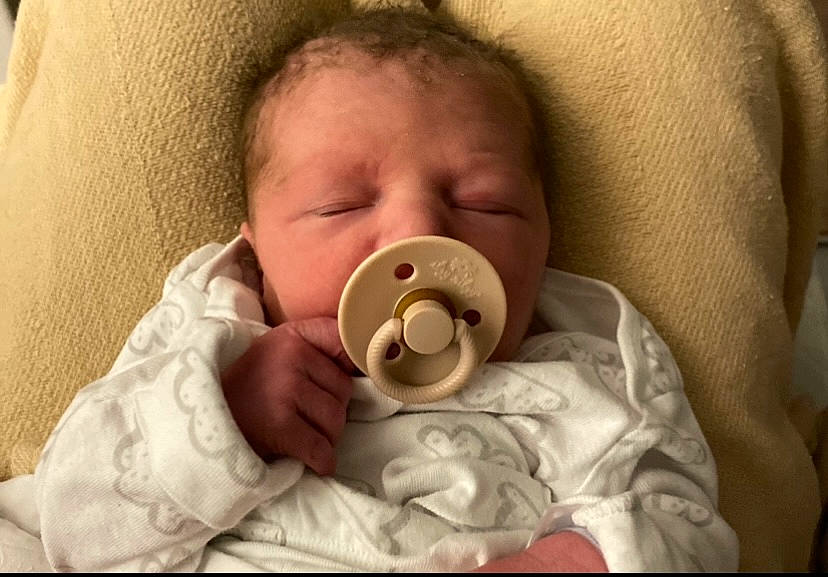 Waylon is registered to the contest to win money with this photo: baby, baby_sleeping, baby_toddler_clothing, bedding, bedtime, blanket, cheek, child, comfort, ear, iris, linens, mouth, nose, person, room, skin, sleep, sleeve, textile