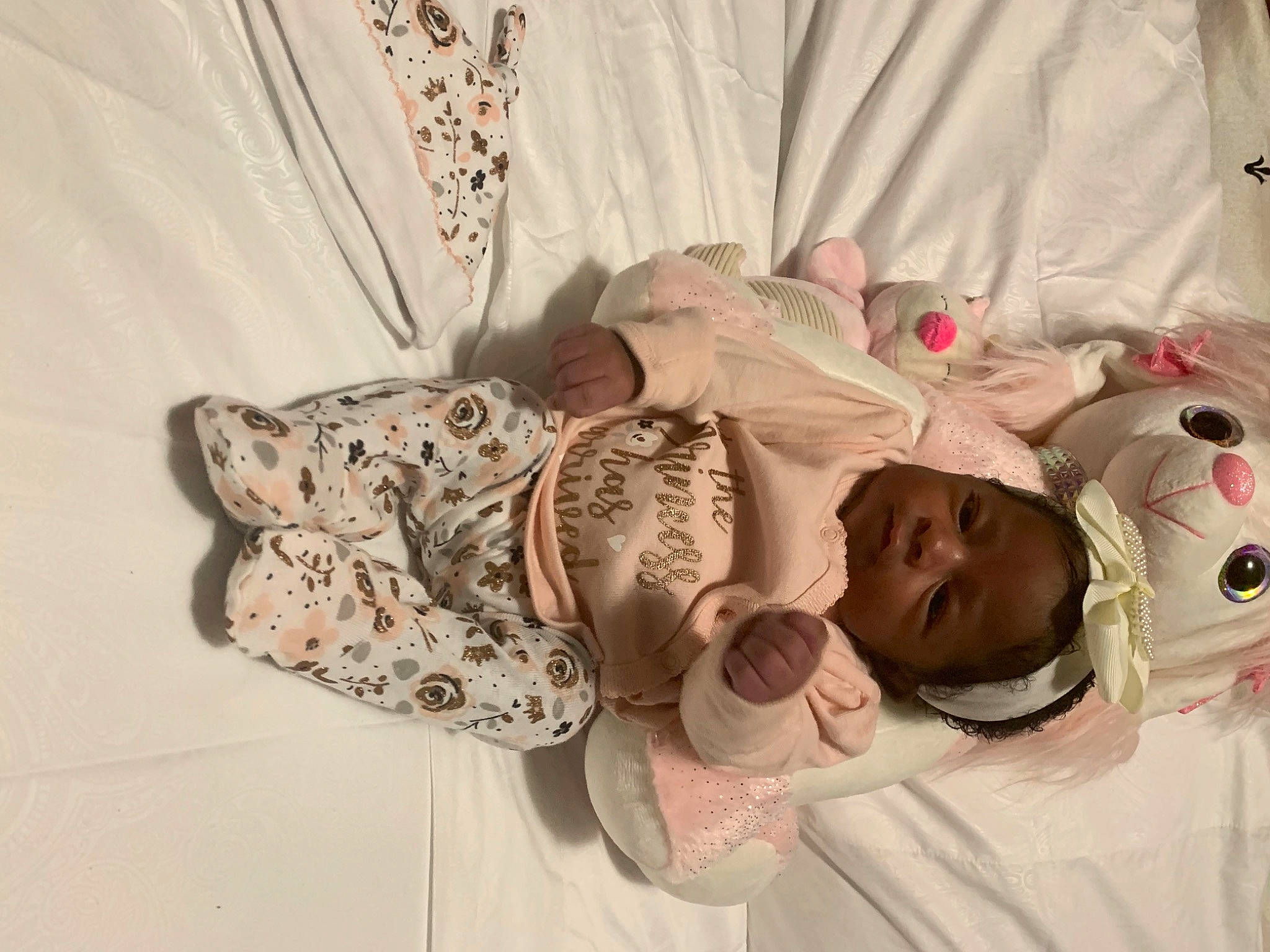 Leilani joined the competition — help win amazing prizes! baby, baby_products, baby_safety, baby_sleeping, baby_toddler_clothing, bed, bedding, bedtime, child, comfort, curtain, hand, hat, linens, pattern, peach, person, room, skin, sleeve