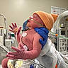 baby, bedside, care, cute, diaper, fragile, gloves, healthcare, hospital, infant, medical, medical_equipment, monitoring, neonatal, newborn, orange_hat, patient, person, small, tubes