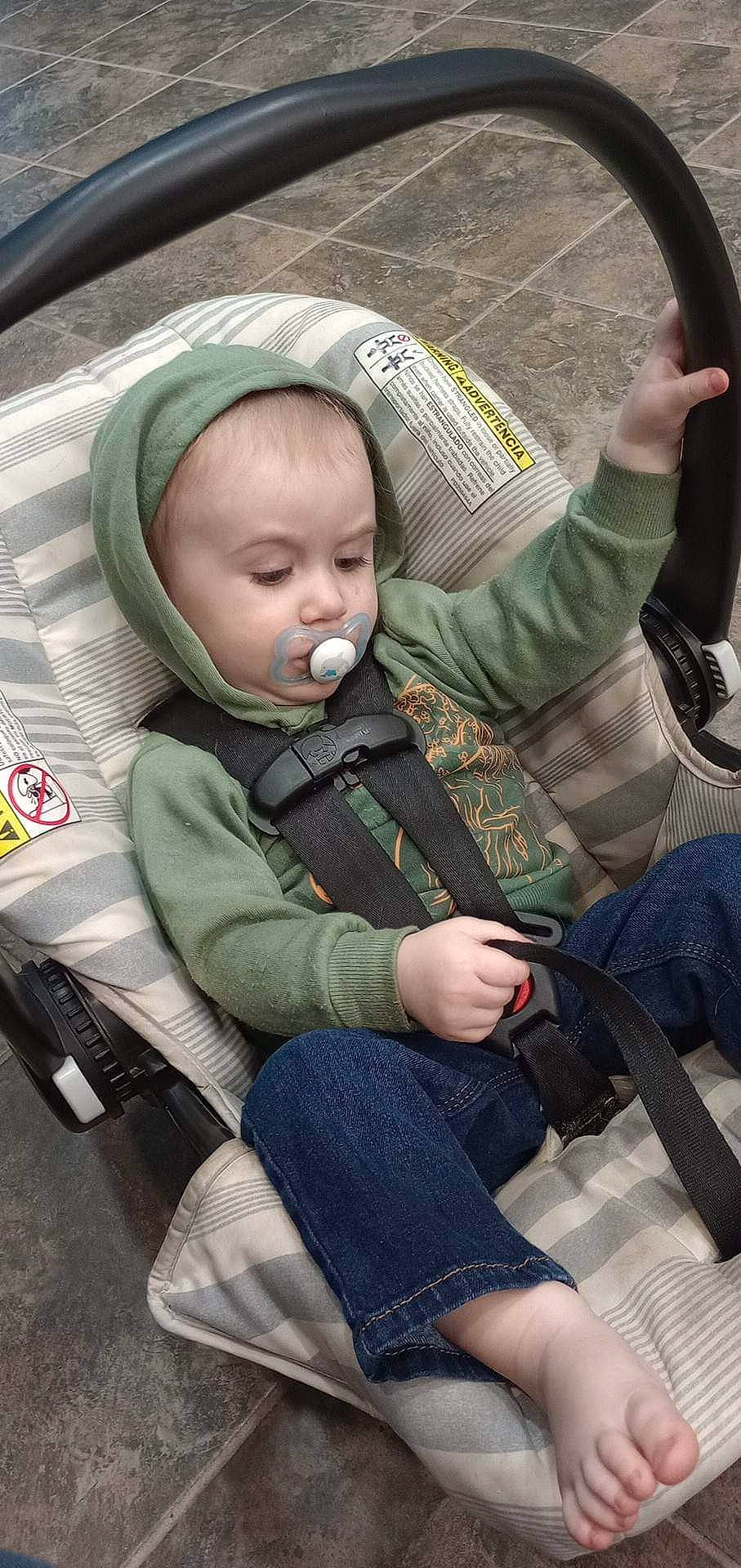 Oliver is registered to the contest to win money with this photo: auto_part, baby, baby_carriage, baby_products, baby_safety, baby_toddler_clothing, car_seat, child, comfort, fun, grass, lap, motor_vehicle, person, sitting, thigh, toddler, tree, vacation, vehicle_door